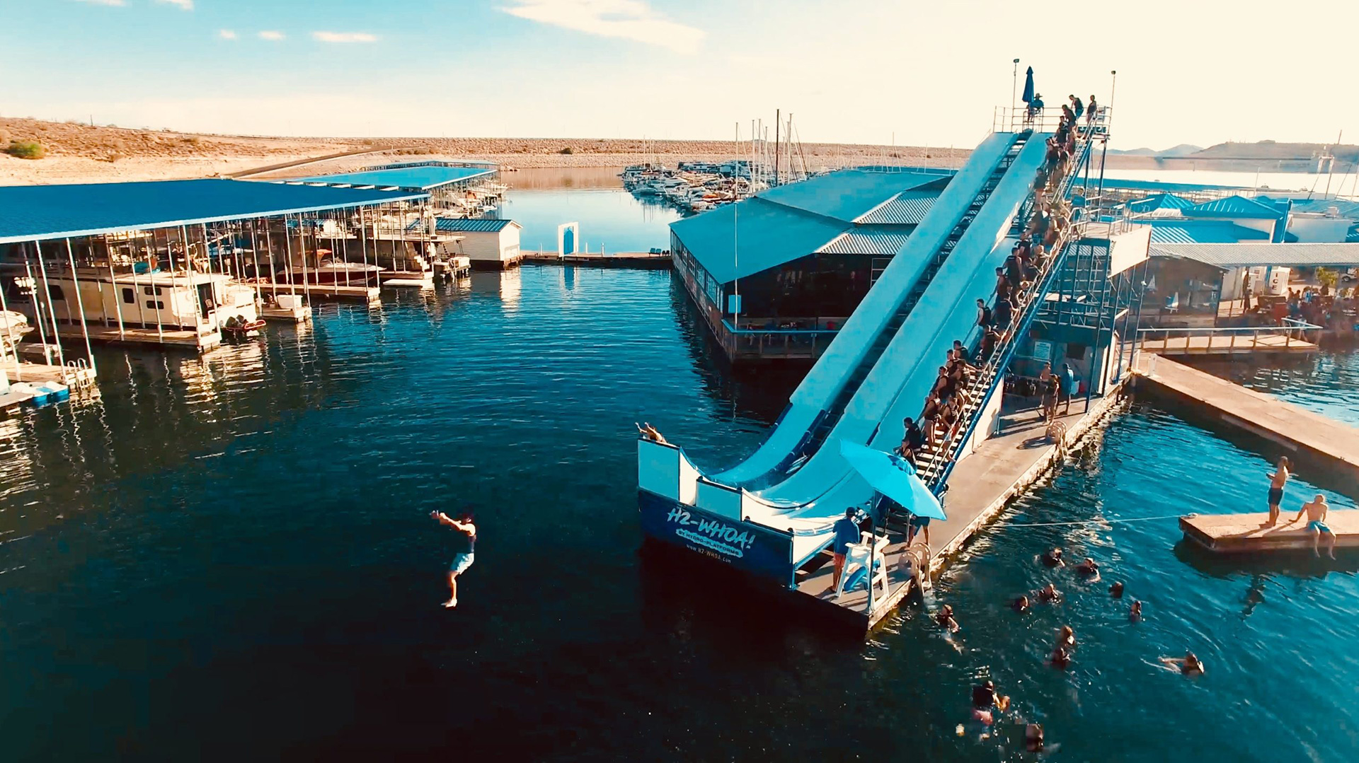 Ariel view of the H2Whoa slide at Lake Pleasant with a person going off the slide