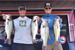 Conrad Demecs and Nick Teschler hold the winning fish for a photo at the WIld West Bass Trail at Roosevelt Lake