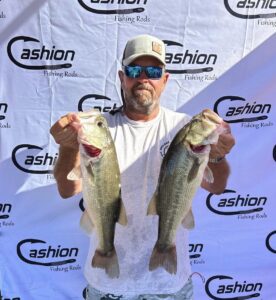 John Fuqua holding up two of his Largemouth Bass at the Cashion Cup Derby at Bartlett Lake 