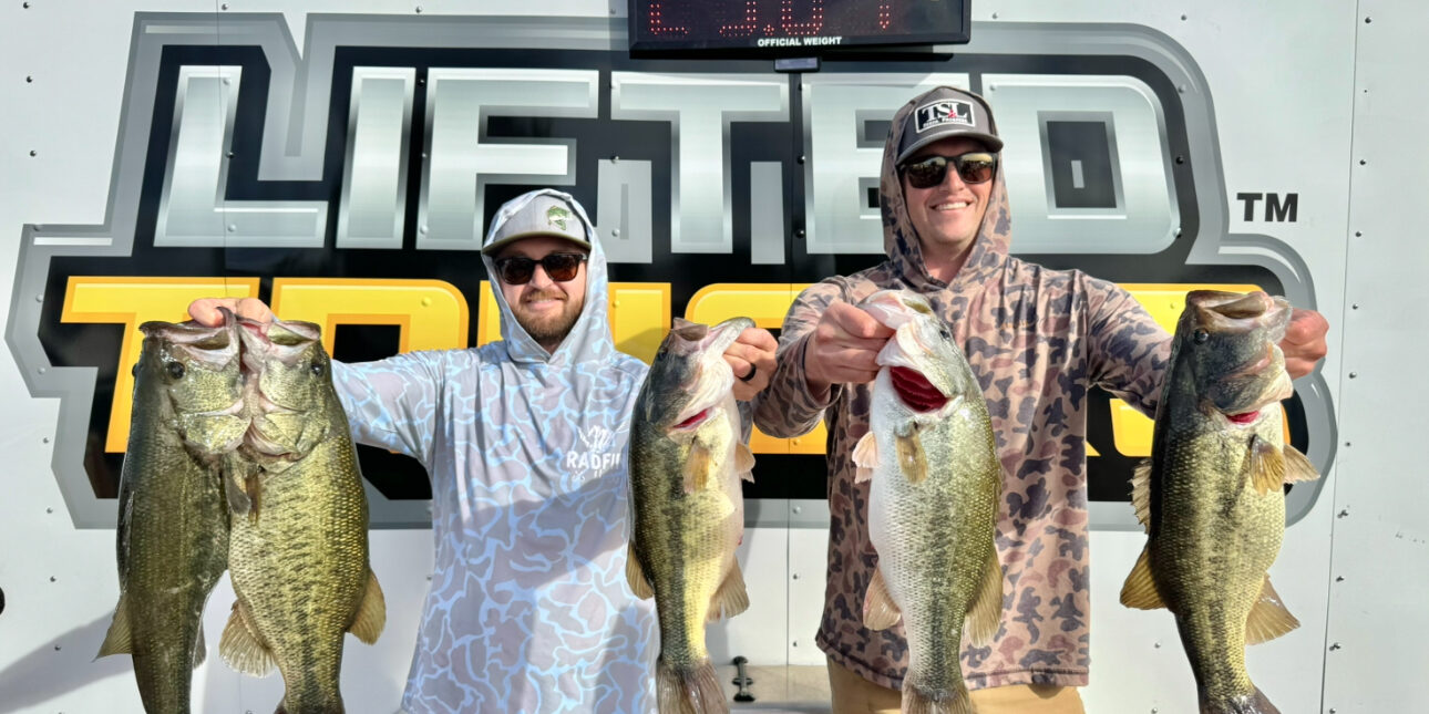 Winners Cody and Josh holding a 25lb bag at Martinez Lake