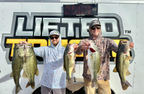 IMG_5315 Winners Cody and Josh holding a 25lb bag at Martinez Lake