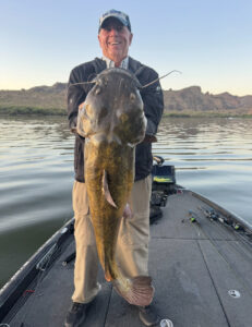 Mark holding a 34.5 lb Flathead catfish
